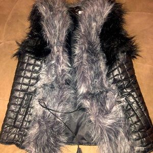 Black and grey fur vest with tags